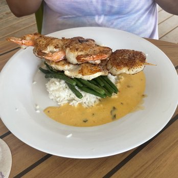 Crabby's Beachside Pavilion - Grilled Sea Scallops with jasmine rice, green beans and Hollandaise sauce - Seafood Near Me - Clearwater Beach, Florida Crabby's Beachside Pavilion - Grilled Sea Scallops with jasmine rice, green beans and Hollandaise sauce - Seafood Near Me - Clearwater Beach, Florida