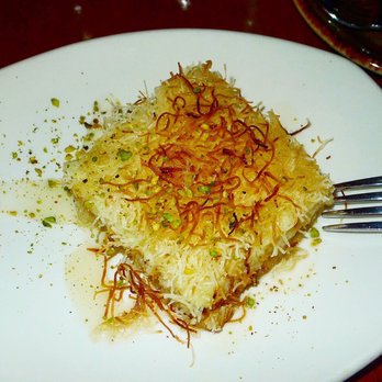 Tabule Restaurant - Künafa Ashta filo layered with custard and topped off with rose water syrup - Middle Eastern Near Me - Toronto, Ontario Tabule Restaurant - Künafa Ashta filo layered with custard and topped off with rose water syrup - Middle Eastern Near Me - Toronto, Ontario