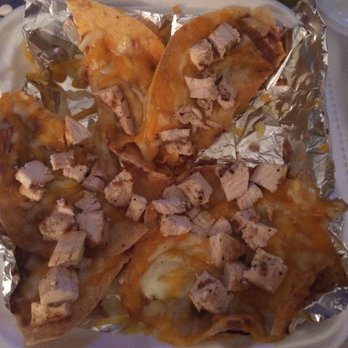 Mexicali Border Cafe - The "chicken fajita nachos" A bit of refried beans, cheese, cubes of grilled chicken, Side of salsa. - Mexican Near Me - Tulsa, Oklahoma Mexicali Border Cafe - The "chicken fajita nachos" A bit of refried beans, cheese, cubes of grilled chicken, Side of salsa. - Mexican Near Me - Tulsa, Oklahoma