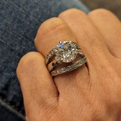 Again, We provided the diamond solitaire. Then John designed the remainder of that setting.