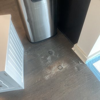 Roochii Cleaning - Didn't bother moving the trash can to clean under it. - Home Cleaning Near Me