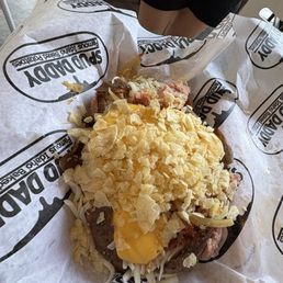 Loaded with ham, spicy butter, grilled onions, nacho & crumbled chips Loaded with ham, spicy butter, grilled onions, nacho & crumbled chips