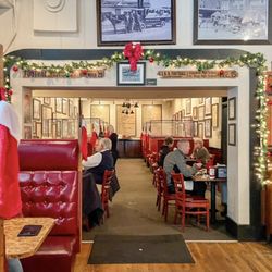 Crystal Beer Parlor - The long dining room, with walls covered in memorabilia