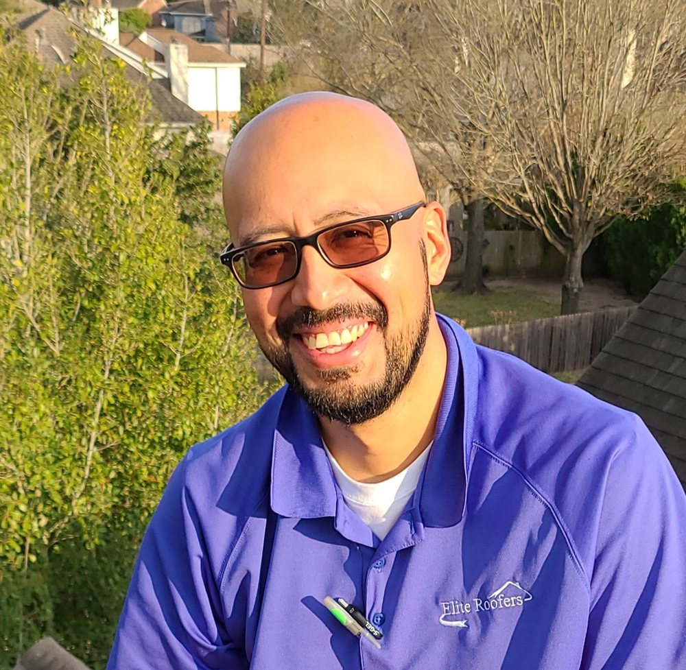 Slide of Elite Roofers