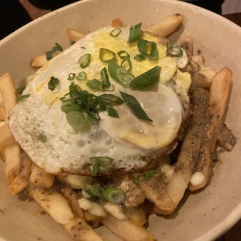 Storm Crow Manor - Poutine with vegan cheese - Bars Near Me - Toronto, Ontario