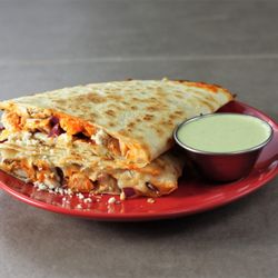 Dillas Quesadillas - BUFFALO BACON - grilled chicken, Frank's buffalo sauce, bacon, red onion, blue cheese... served with scratch Buttermilk Ranch