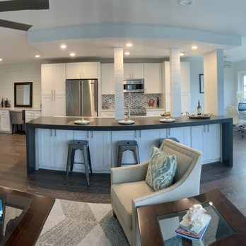 ICONIC Stone Design - Staggered high bar with waterfalls at Golden Gate project. Calcutta Classic quartz with Wood Ash Brushed quartz for high bar. - Kitchen & Bath Near Me - Sarasota, Florida ICONIC Stone Design - Staggered high bar with waterfalls at Golden Gate project. Calcutta Classic quartz with Wood Ash Brushed quartz for high bar. - Kitchen & Bath Near Me - Sarasota, Florida