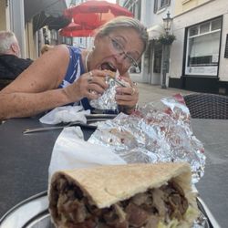 Alanya Grill - A Happy Customer eating a luscious Döner!