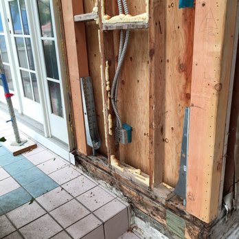 Protech Construction - this is how they first tried to fix this corner. They only replaced a small part of water damaged wood under earthquake bracket - General Contractors Near Me - Anaheim, California Protech Construction - this is how they first tried to fix this corner. They only replaced a small part of water damaged wood under earthquake bracket - General Contractors Near Me - Anaheim, California