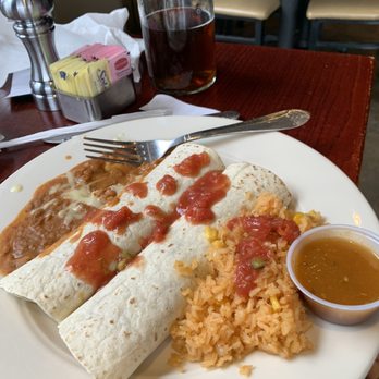 Santo Coyote Restaurant - Dos Amigos Burrito with the cheese topping on the side. Doesn't this look like Taco Bell? - Mexican Near Me - Little Rock, Arkansas Santo Coyote Restaurant - Dos Amigos Burrito with the cheese topping on the side. Doesn't this look like Taco Bell? - Mexican Near Me - Little Rock, Arkansas