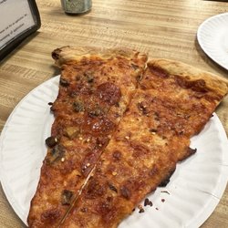 Cam's Pizzeria - Close up of half pepperoni+mushroom and half cheese