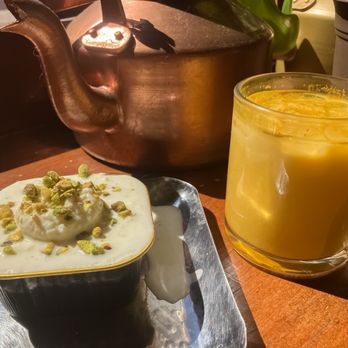 Chaiwale & Co. - Rasmalai milk cake and an iced golden latte (12 oz.) - Cafes Near Me - Orange, California Chaiwale & Co. - Rasmalai milk cake and an iced golden latte (12 oz.) - Cafes Near Me - Orange, California