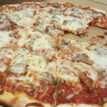 Primo Pizza & Catering - Not crazy about sausage, but they put a good amount on their pizza! - Pizza Near Me - Barrington, Illinois