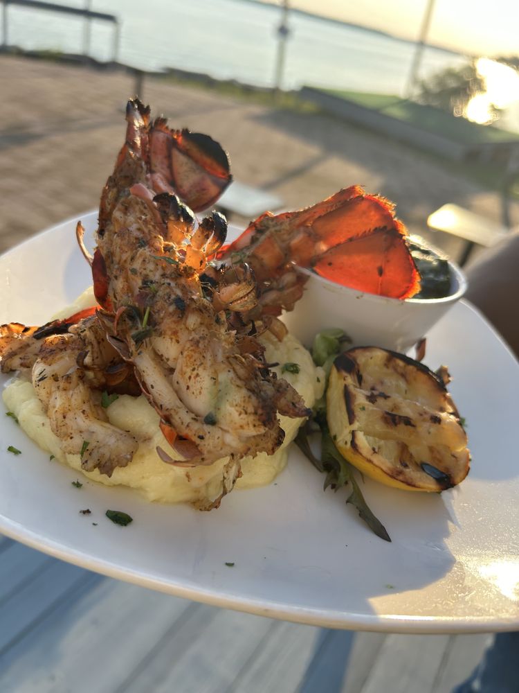 The 7th District Waterfront Bar & Grill Logo