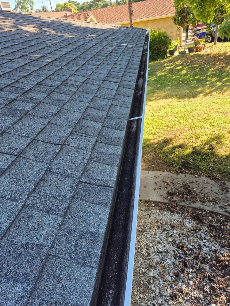 Slide of Cleaning Gutters Service