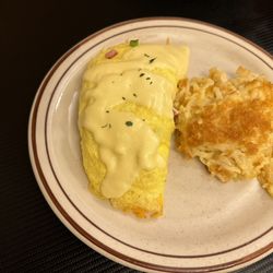 The Enchanted Cafe - Western omelette with hollandaise sauce.