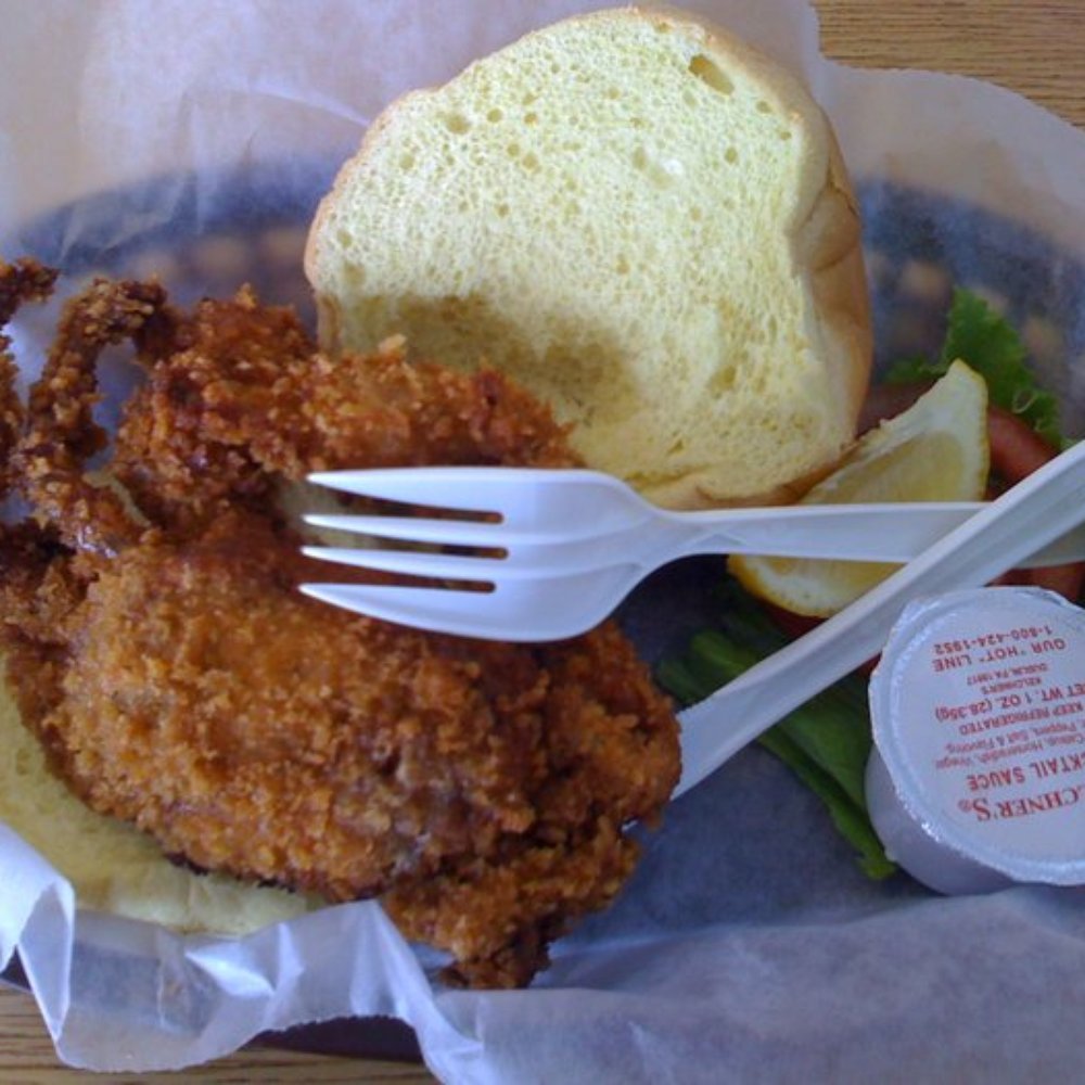 Del's Grill - a fried chicken sandwich with a side salad - American Near Me - Ocean City, New Jersey