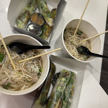 Pho Lane - Spicy lemongrass broth, sliced beef Pho with extra noodles. 2 order of beef spring rolls with peanut and house sauce. - Vietnamese Near Me - McKinney, Texas