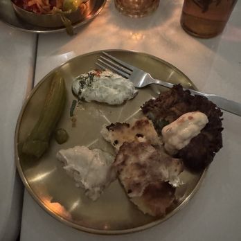 Motek - Spicy veggies, latke, hummus and za'atar sauce. - Mediterranean Near Me - Aventura, Florida Motek - Spicy veggies, latke, hummus and za'atar sauce. - Mediterranean Near Me - Aventura, Florida