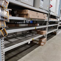 Lowe's Home Improvement - Empty shelves and many employees standing around not doing anything.