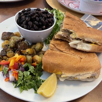 Cuba 1918 - Cuba I Sandwich with soffits potatoes and black beans. - Cuban Near Me - San Antonio, Texas Cuba 1918 - Cuba I Sandwich with soffits potatoes and black beans. - Cuban Near Me - San Antonio, Texas