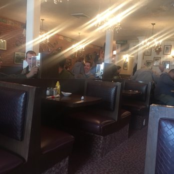Restaurant Carole - people sitting at tables in a restaurant - Pizza Near Me - Lachute, Quebec Restaurant Carole - people sitting at tables in a restaurant - Pizza Near Me - Lachute, Quebec