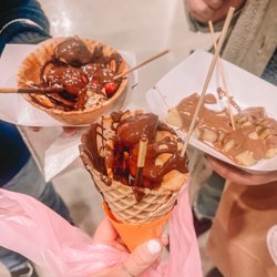 Chocolate World Expo - Fondue waffle cone, fondue waffle bowl, and pineapple with milk chocolate drizzle