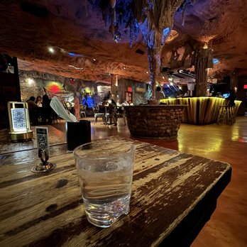 La Caverna - Corner table. Got the view of the whole place and just before the happy hour rush. - New American Near Me - New York, New York