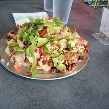 Vibe Cafe - Jackfruit Nachos. This is vegan nachos done right! Lil spicy but good!! - Cafes Near Me - Hilo, Hawaii Vibe Cafe - Jackfruit Nachos. This is vegan nachos done right! Lil spicy but good!! - Cafes Near Me - Hilo, Hawaii