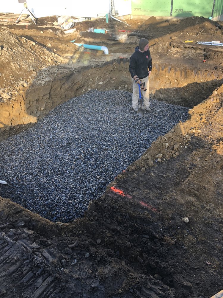 Slide of EmRay Excavating