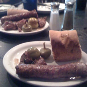 Santarpio's Pizza - Sausage and Lamb - Pizza Near Me - Boston, Massachusetts Santarpio's Pizza - Sausage and Lamb - Pizza Near Me - Boston, Massachusetts