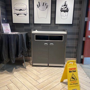 McDonald's - a caution sign on the floor - Burgers Near Me - Conneaut, Ohio McDonald's - a caution sign on the floor - Burgers Near Me - Conneaut, Ohio