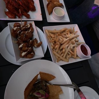 Spire 73 - wings, samosas, bangkok crispy shrimp, Truffle Parmesan Fries, ahi tuna tartare - Cocktail Bars Near Me - Los Angeles, California Spire 73 - wings, samosas, bangkok crispy shrimp, Truffle Parmesan Fries, ahi tuna tartare - Cocktail Bars Near Me - Los Angeles, California