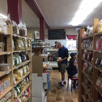 The Clark Fork Pantry - a man and a child in a grocery store - Delis Near Me - Clark Fork, Idaho