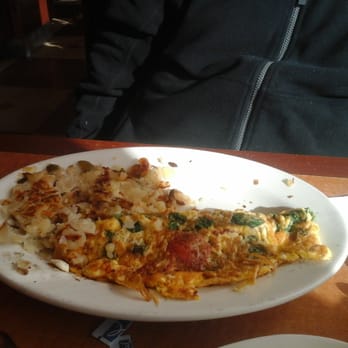 Nutley Diner - Goat cheese omelet with spinach, tomatoes onions and home fries - Diners Near Me - Nutley, New Jersey Nutley Diner - Goat cheese omelet with spinach, tomatoes onions and home fries - Diners Near Me - Nutley, New Jersey