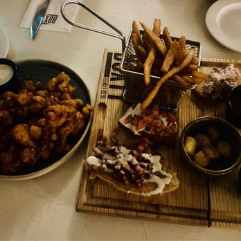 The Boxty House - "Somebody Feed Phil" platter and fried cauliflower. So delicious! - Irish Near Me - Dublin, D The Boxty House - "Somebody Feed Phil" platter and fried cauliflower. So delicious! - Irish Near Me - Dublin, D