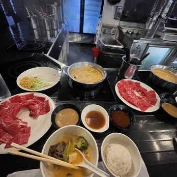 Rolling Boil - Spicy thai broth, New York steak, all 3 sauces, white rice - Hot Pot Near Me - Anaheim, California Rolling Boil - Spicy thai broth, New York steak, all 3 sauces, white rice - Hot Pot Near Me - Anaheim, California