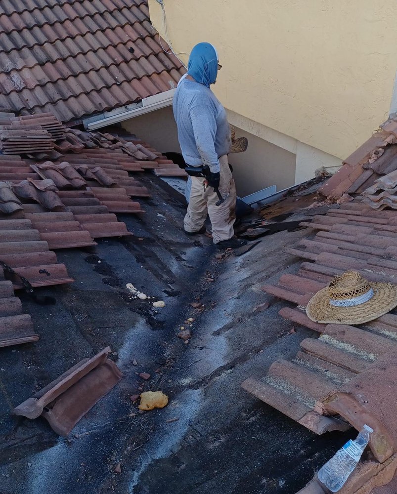 Slide of Guaranteed Roofing Solutions