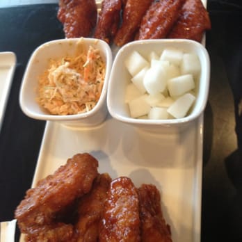 Bonchon Arlington - Medium wings, half spicy, half soy garlic - Chicken Wings Near Me - Arlington, Virginia Bonchon Arlington - Medium wings, half spicy, half soy garlic - Chicken Wings Near Me - Arlington, Virginia