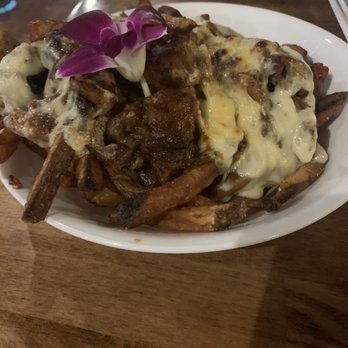 The Yard - Newark - Zanzibar fries with Jerk Chicken - American Near Me - Newark, New Jersey