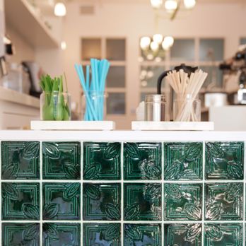 Little Juice - a kitchen counter with green tiles - Coffee & Tea Near Me - Harbor Springs, Michigan Little Juice - a kitchen counter with green tiles - Coffee & Tea Near Me - Harbor Springs, Michigan