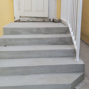 Flores Construction - Newly remodeled backdoor porch stairs - General Contractors Near Me