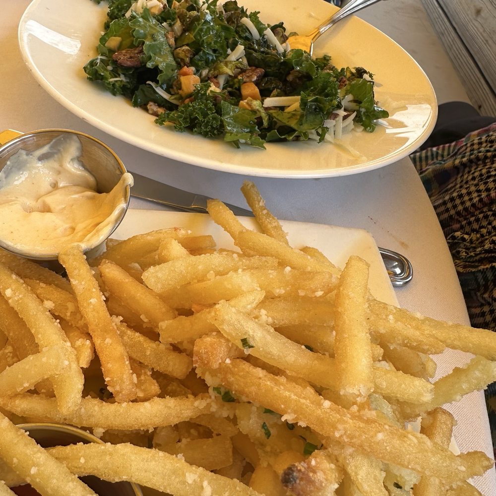 Sundays On The Bay - Truffle fries with a kale salad - Seafood Near Me - Hampton Bays, New York Sundays On The Bay - Truffle fries with a kale salad - Seafood Near Me - Hampton Bays, New York