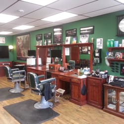 Foley's Barber Shop - Foley's Barber Shop has two Barber stations with 19 inch televisions at each station and a large 55 inch for all to view.