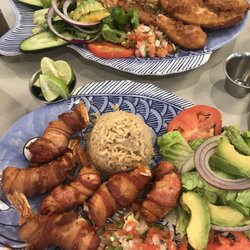 La Concha Mariscos & Antojitos Mexicanos - Top dinner is the fried tilapia - bottom is the cheese filled shrimp wrapped in bacon yum!!!