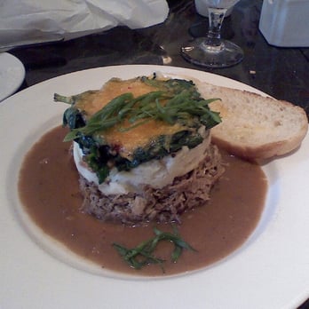 Palace Café - Shepherds Pie with Pulled Pork, Mashed and Spinach. - Cajun/Creole Near Me - New Orleans, Louisiana Palace Café - Shepherds Pie with Pulled Pork, Mashed and Spinach. - Cajun/Creole Near Me - New Orleans, Louisiana