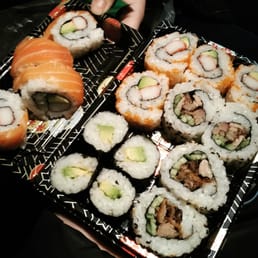 1/2 Tiger roll on the left and Maki box on the right (crispy duck roll,  california roll and avocado maki)! ~£13