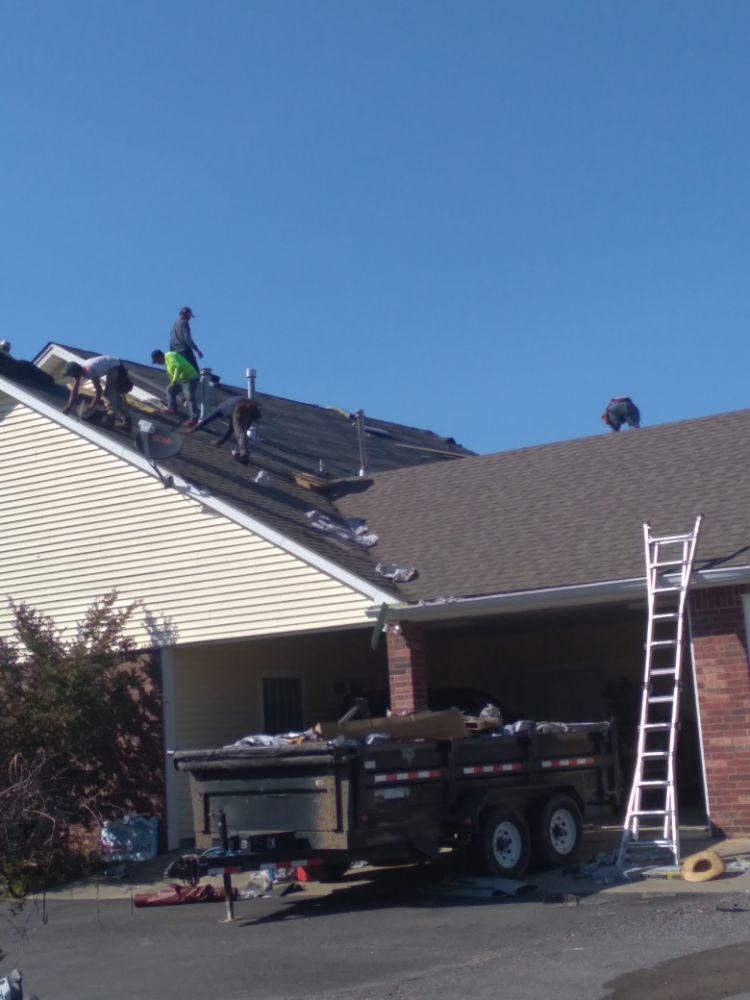 Slide of J&K Roofing Company