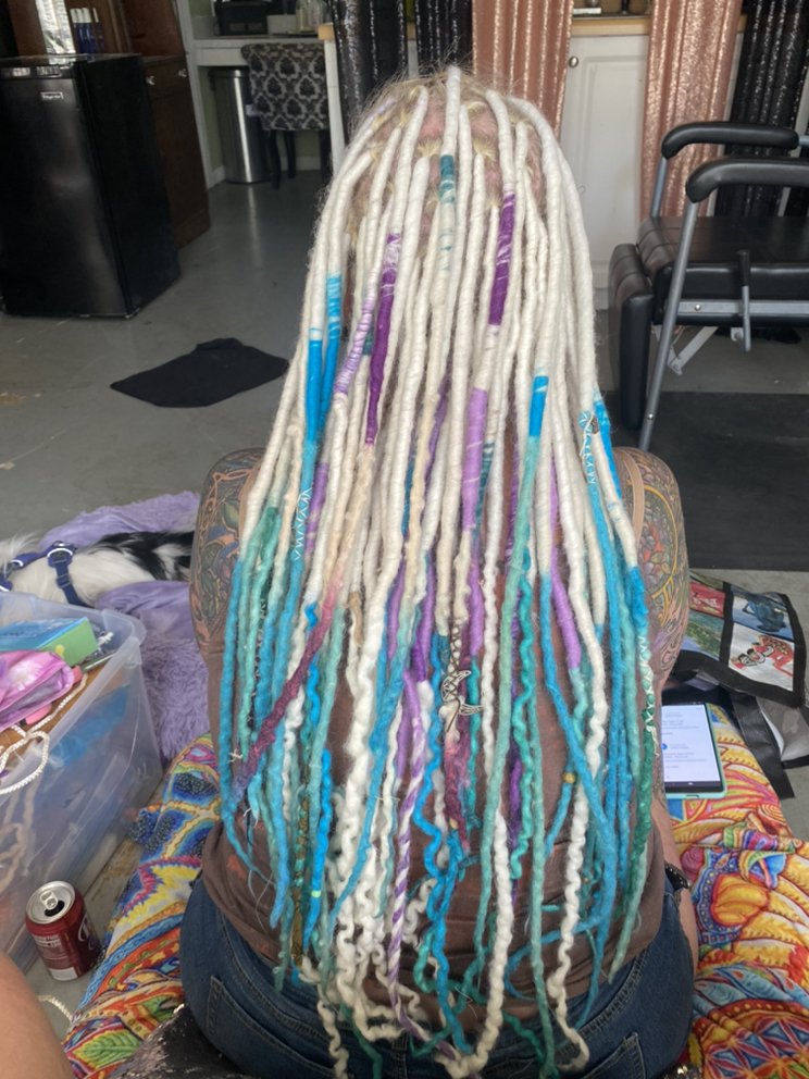 Morphos Dreadlock Parlor Logo
