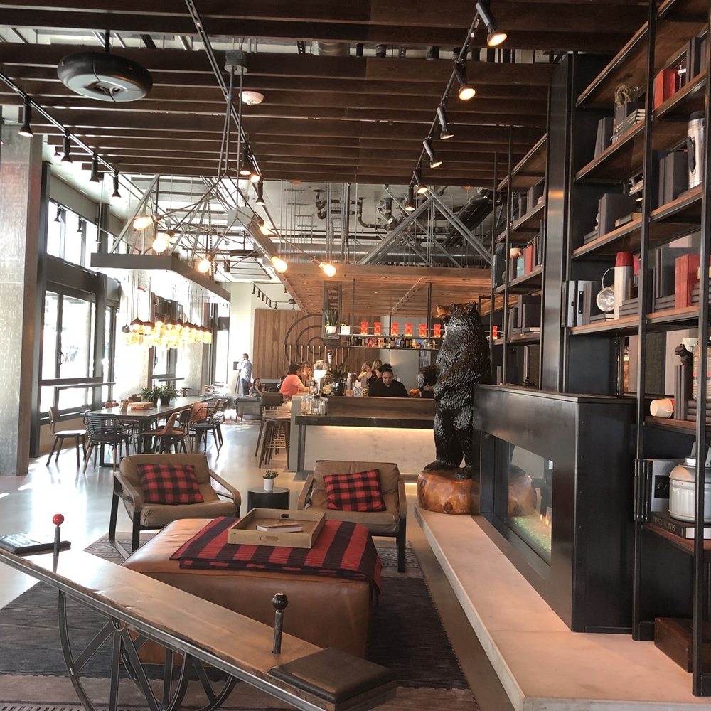 Moxy Seattle Downtown - Note the seesaw in the front of the picture. Ride it! Check in desk is just past the giant bear. Have a drink! - Hotels Near Me - Seattle, Washington